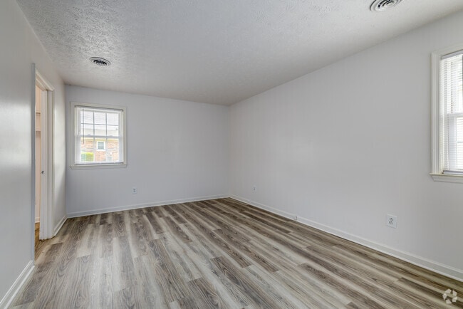 2BR, 1.5BA - 1,100SF - Primary Bedroom - Fox Run Cottages