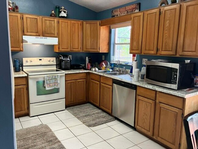 Foto del edificio - 907 Lacey Oaks Ct