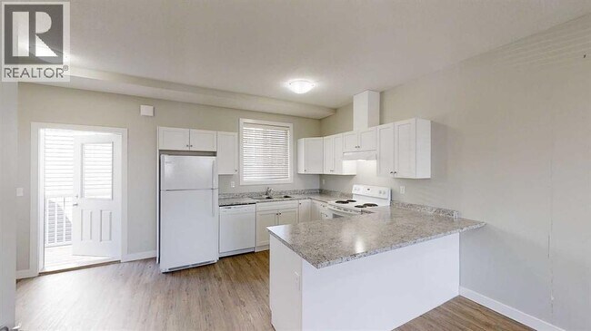 Photo du bâtiment - 9503-9112 112 Ave