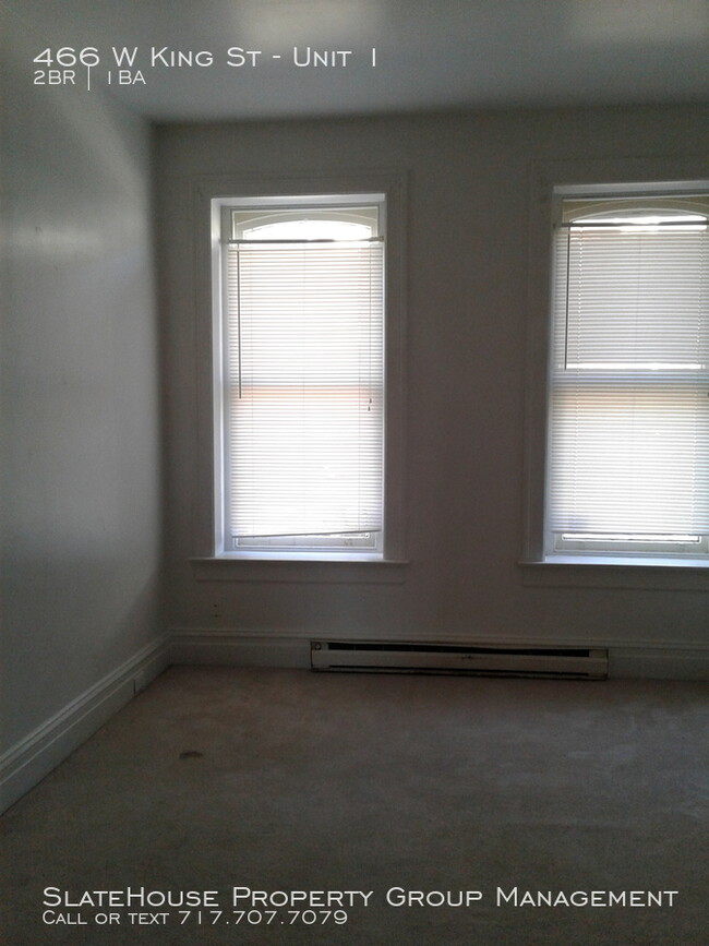 Building Photo - First floor two bedroom with yard!