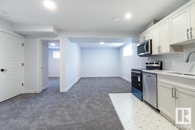 Photo du bâtiment - 32 Rosewood Wy