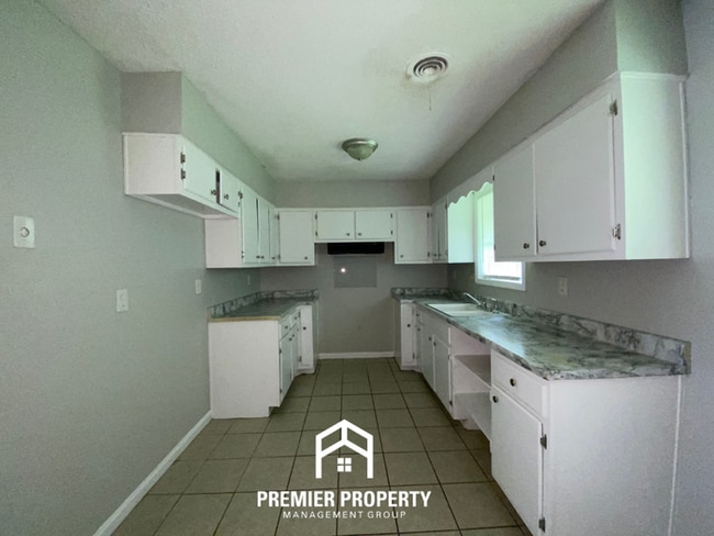 Building Photo - Spacious 4BR Family Home in Raleigh | Modern Tile Floors & Spacious Backyard
