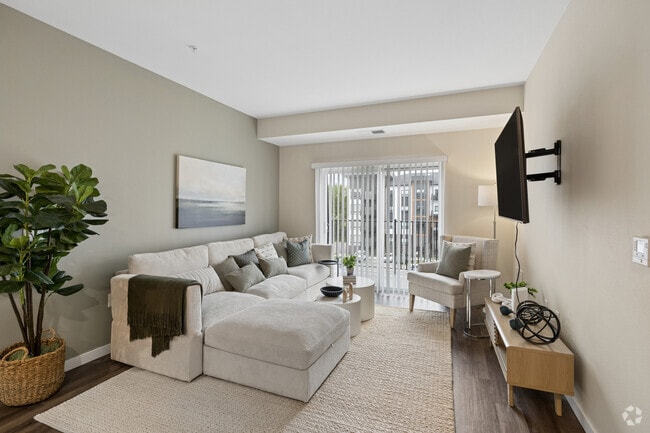 2 habitaciones, 2 baños - 1072 pies cuadrados - Sala de estar - Avalon Apartments & Townhomes
