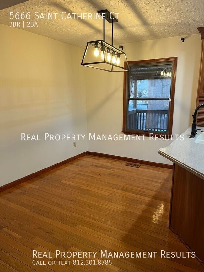 Building Photo - 5666 St Catherine Ct