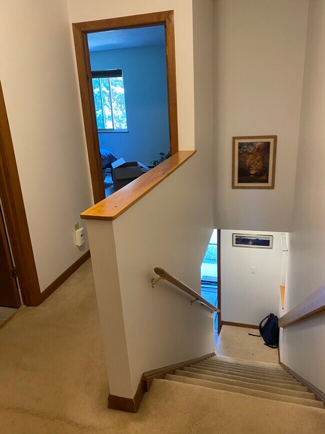 Hall to first floor, peek the second bedroom at the end. - 10 Hideaway Ln