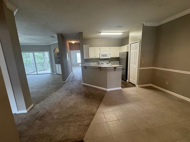 Building Photo - Sail Cove 2/2 Upstairs Condo Available Now!