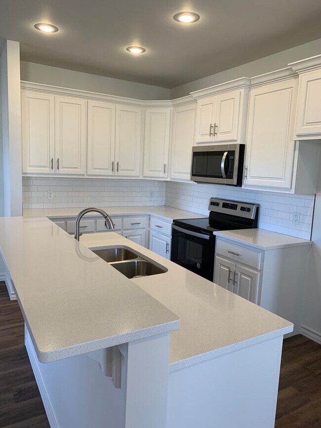 Building Photo - Beautiful brand new!! All the bells and wh...