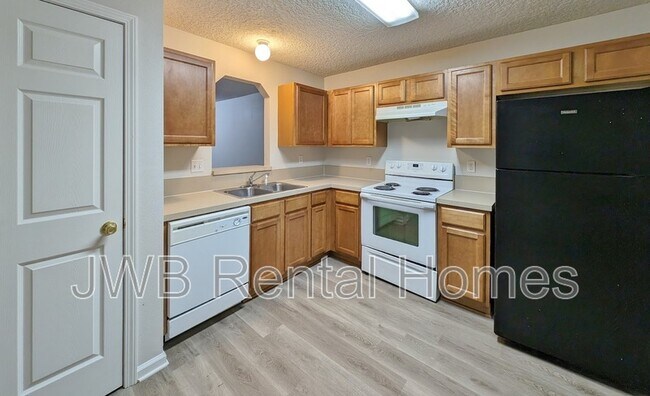 Foto del edificio - 8408 McGirts Village Ln