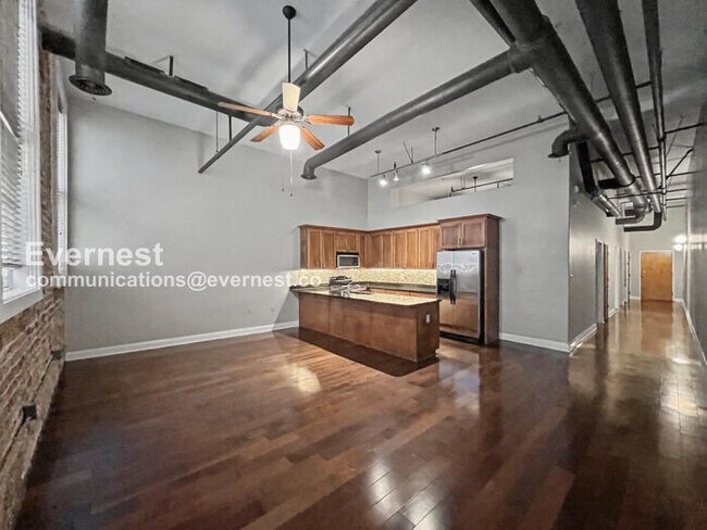 Photo - 2 Bed/2 Bath Condo with Modern Amenities / Pet-Friendly / Available Now!