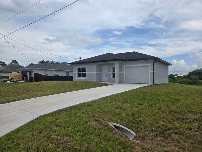 Building Photo - BRAND NEW 2/2/1 -  SW LEHIGH ACRES