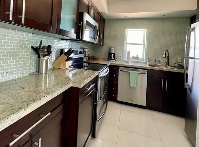 Building Photo - 5701 Collins Ave