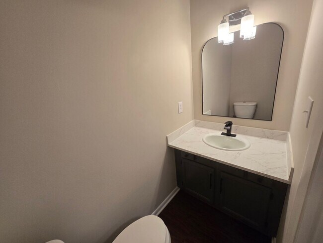Building Photo - Stylishly Renovated End-Unit Townhome with Easy Raleigh Access