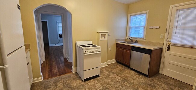 Kitchen with Dishwasher - 703 Mayflower Dr