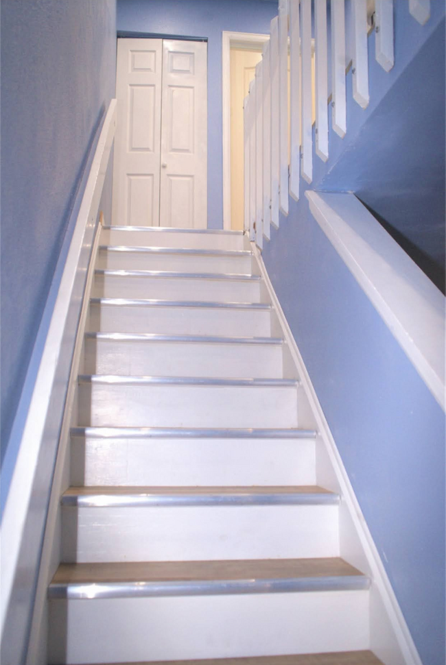 Stairs way leading to the 2nd floor, bedrooms, main bathroom and in unit laundry room - 2464 Astrozon Cir