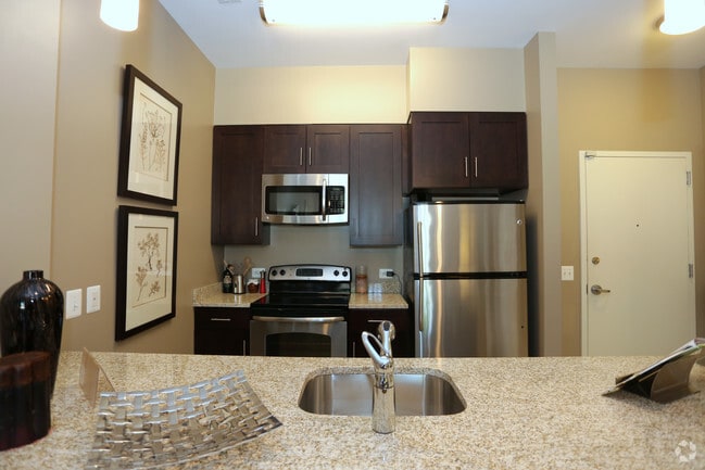 1 Bedroom 737 SF-Kitchen - The Fitzgerald Apartments
