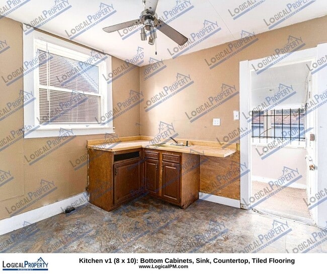 Building Photo - Cozy 4/2 Bungalow: APPLIANCES,Covered Porc...