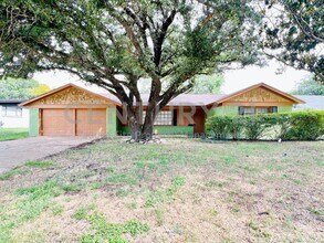 Building Photo - 5908 Wedgmont Cir N