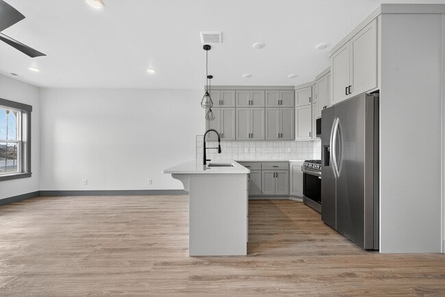 Building Photo - MUST SEE TOWNHOMES IN AMMON RIGHT OFF BEAC...