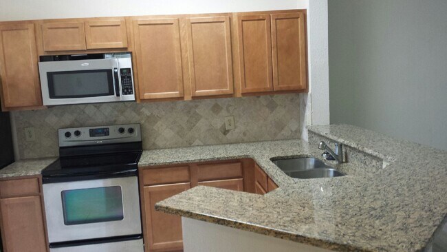 Foto del edificio - Welcome home to this well-located 2-bedroom, 2-bath second-floor condominium in the Dr. Phillips ...