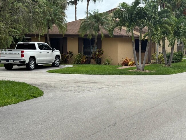 House has two private parking spaces - 13169 SW 91st Ct