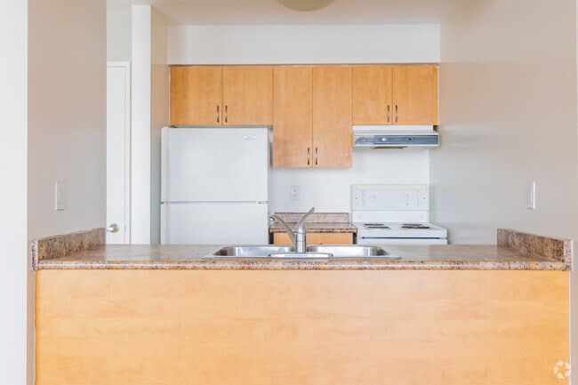 3BR, 2BA - 745SF - Kitchen - The Landmarq Rental Residences