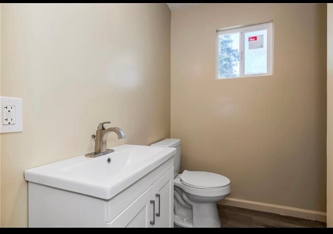 New sink and toilet - 1216 S Osage St