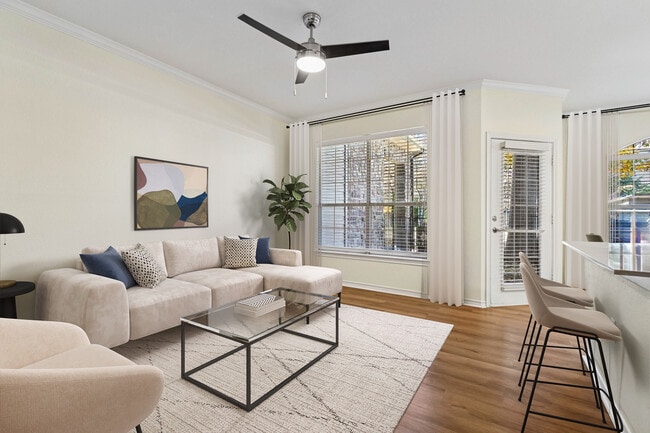 Renovated Package I living room with hard surface flooring - eaves North Dallas