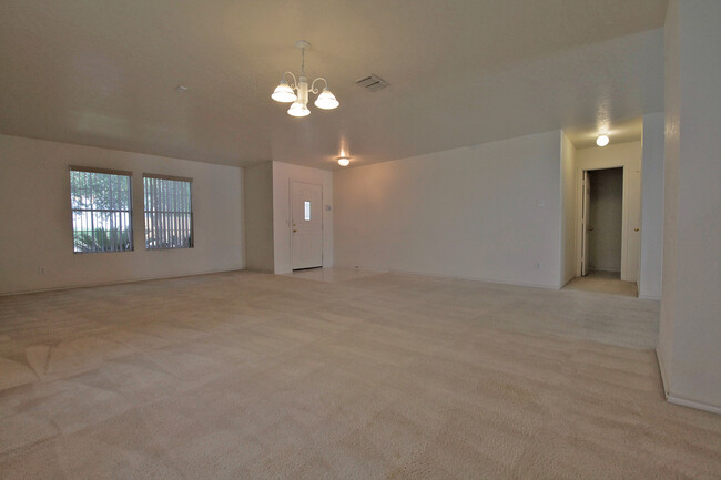 Building Photo - SPACIOUS 3208 SQUARE FOOT HOME FEATURING 4...