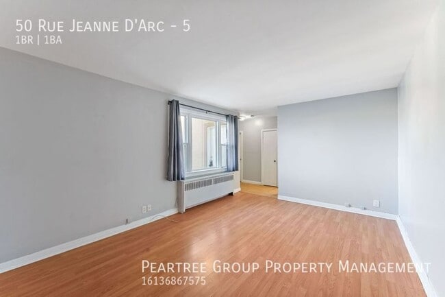 Photo du bâtiment - Joyful Jeanne-D'Arc-1 bed apartment for rent