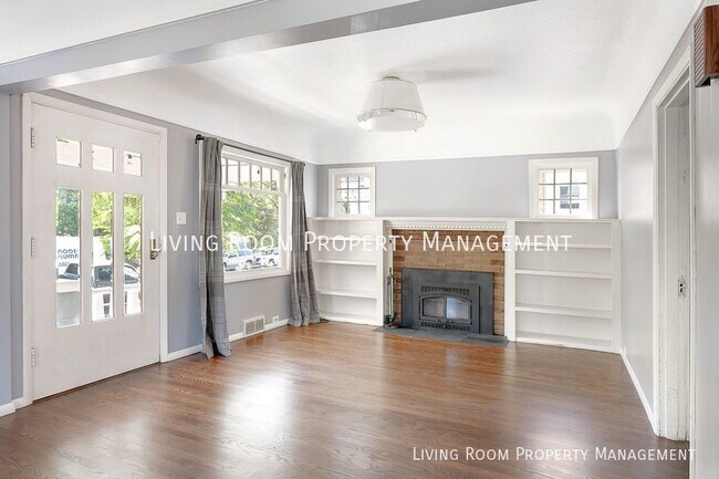 Building Photo - Craftsman Stunner w/ Finished Garage Bonus...
