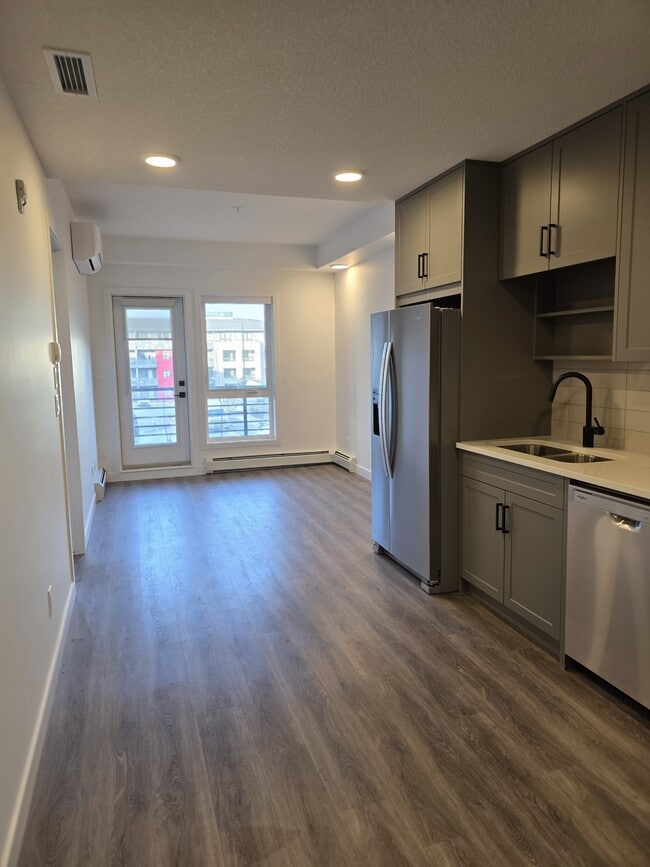 Building Photo - 350-3350 Livingston Common NE