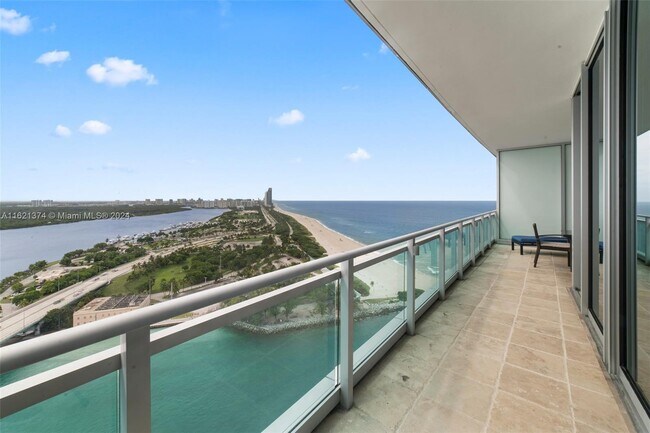 Building Photo - 10295 Collins Ave