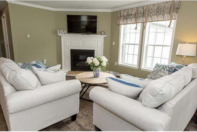 Comfy living area with gas fireplace. - 12 David Dr