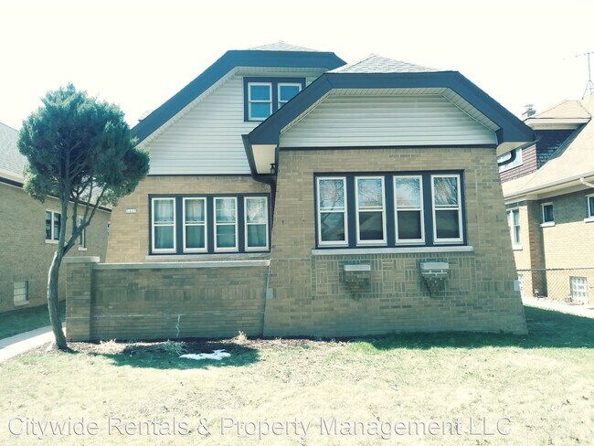 Building Photo - 4 br, 1.5 bath House - 3223 N. 45th St.