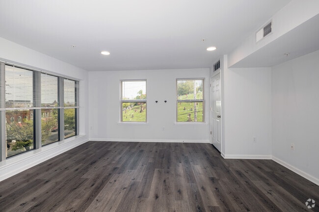 2BR, 1BA - 982SF - Living Room - City Views Apartments