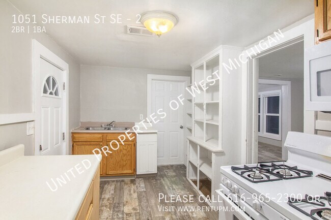 Building Photo - Available Now | 2 Bed, 1 Bath Upper Apartm...