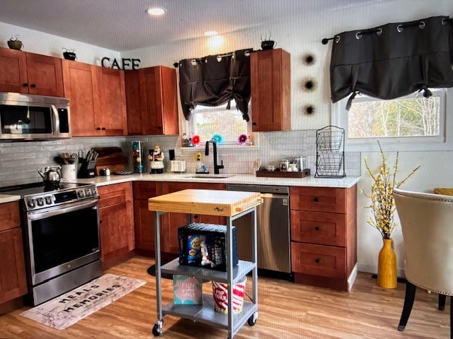 Updated kitchen featuring stainless steel appliances, ample cabinet space, - 13 Brandywine Dr