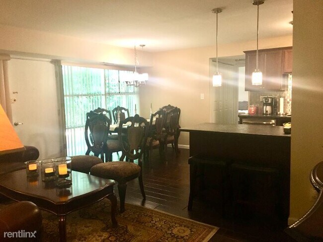 Building Photo - 1 br, 1 bath Condo - 4325 Americana Dr