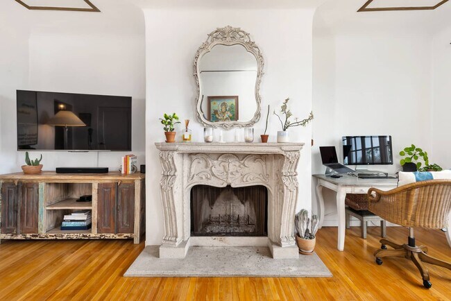 living w/ decorative fireplace - 1345 N Hayworth Ave