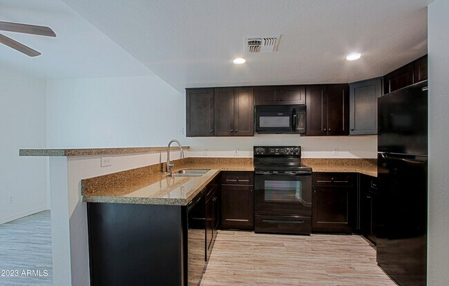 Building Photo - 5641 S Jacaranda Rd