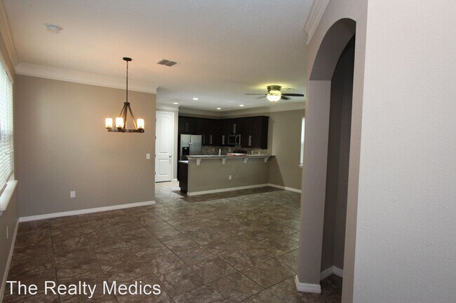 Building Photo - 4 br, 2.5 bath House - 15764 Avenue Of The...