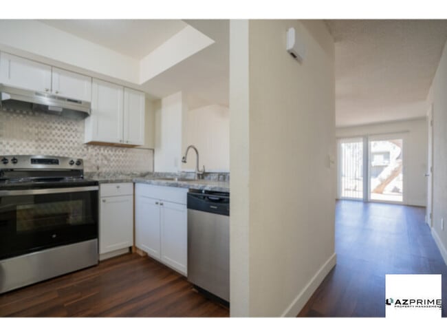 Building Photo - Experience Modern Living in this Remodeled...