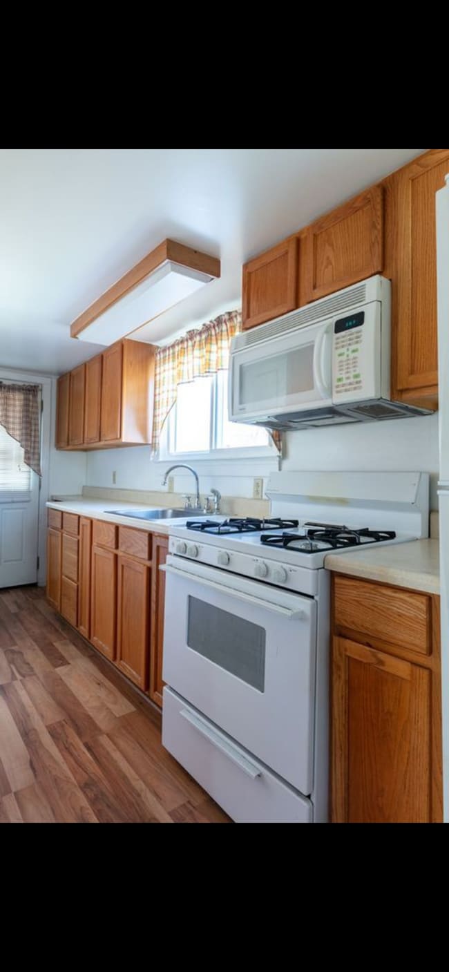 Gally Kitchen to outside deck - 260 Curtis St