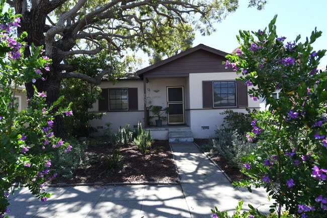 Front of house with mature draught tolerant plants - 3935 Berryman Ave