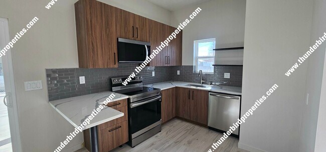 Foto del edificio - FULLY REMODELED 1-bedroom, 1-bath home with a carport