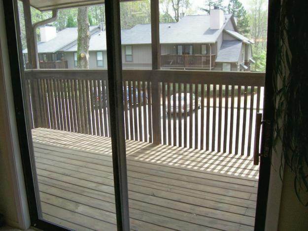 Deck off of living room. - 702 Cumberland Ct SE
