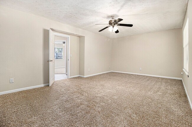 Building Photo - Rare Find: 4 Bedroom + 3 Bathroom + 2-Car ...