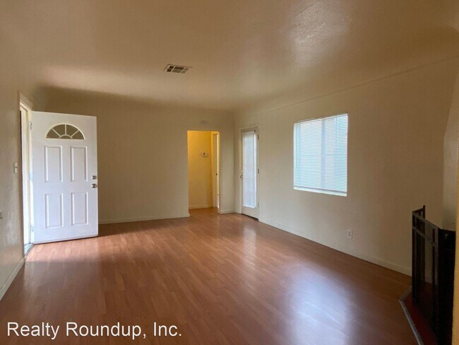Building Photo - 4 br, 3 bath House - 205 W Swain Rd