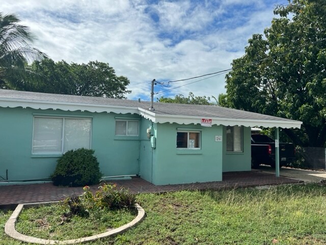 front view on buttonwood - 26 Poinciana Dr