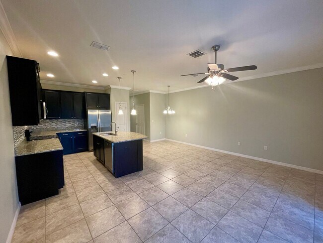 Building Photo - 3 Bedroom, 2.5 Bath Town Home In Gated Mit...